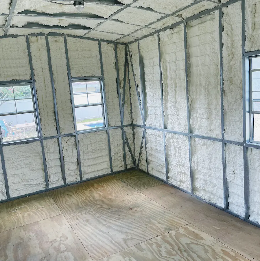 Closed-cell spray foam insulation applied to wall cavities in a residential project in Burnet
